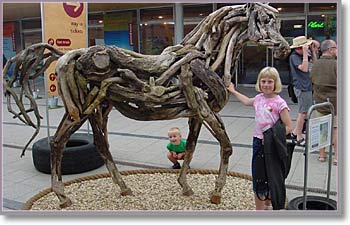 Jenny & Tom at Eden with wood horse